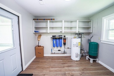 Completely gutted and beautifully remodeled, this waterfront - photo 35