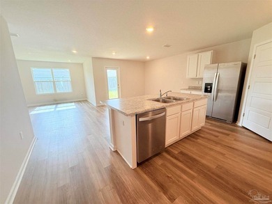 Welcome home to this like-new 4-bedroom, 2-bath residence - photo 4