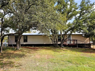 Lake Home For Sale in May, Texas