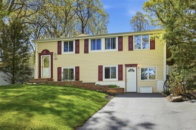Welcome to 26 Woodchuck Lane in Setauket, located in the highly - photo 1