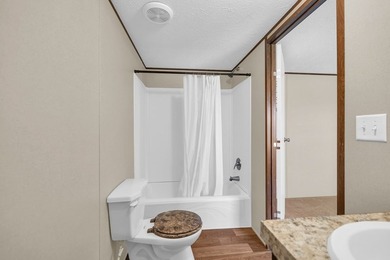 Nestled in the heart of the Lakelands, this homeoffers a rare - photo 12