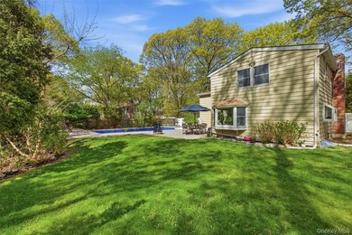 Welcome to 26 Woodchuck Lane in Setauket, located in the highly - photo 2