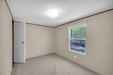Nestled in the heart of the Lakelands, this homeoffers a rare - photo 13