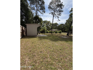 Charming 3-bedroom, 1.5-bath brick home situated on nearly half - photo 9