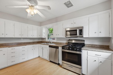 Cute one story bungalow in Winsted sits on an extra large corner - photo 3