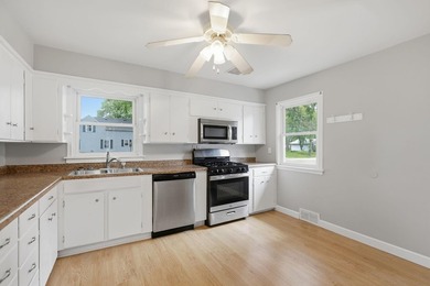 Cute one story bungalow in Winsted sits on an extra large corner - photo 4