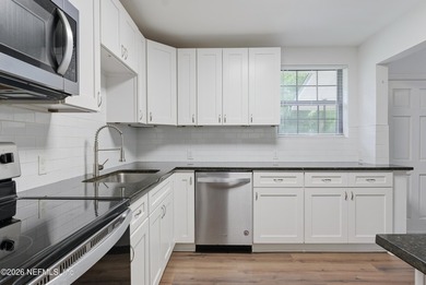 Experience refined living in this meticulously maintained - photo 12