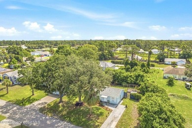 Welcome home to this cozy 2 bed 1 bath residence in Palm Bay - photo 2