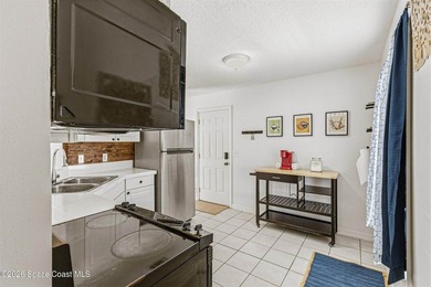 Welcome home to this cozy 2 bed 1 bath residence in Palm Bay - photo 3