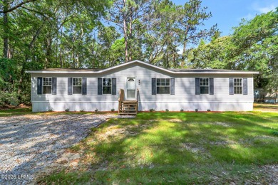 Fully renovated 4 bed, 2 bath mobile home offering modern - photo 1