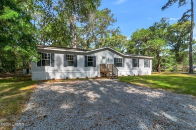 Fully renovated 4 bed, 2 bath mobile home offering modern - photo 2