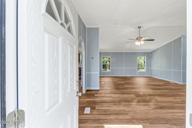 Fully renovated 4 bed, 2 bath mobile home offering modern - photo 3