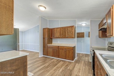 Fully renovated 4 bed, 2 bath mobile home offering modern - photo 8