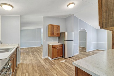 Fully renovated 4 bed, 2 bath mobile home offering modern - photo 9