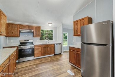Fully renovated 4 bed, 2 bath mobile home offering modern - photo 10