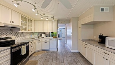 Welcome home to your third floor condo with a most-exclusive - photo 12