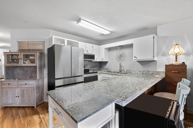 Discover easy, low-maintenance living in the desirable Baytree - photo 13