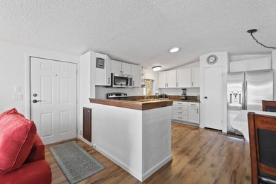 Move-in ready and fully furnished 2 bed, 2 bath home on a - photo 7