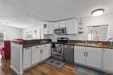 Move-in ready and fully furnished 2 bed, 2 bath home on a - photo 8