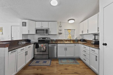 Move-in ready and fully furnished 2 bed, 2 bath home on a - photo 9