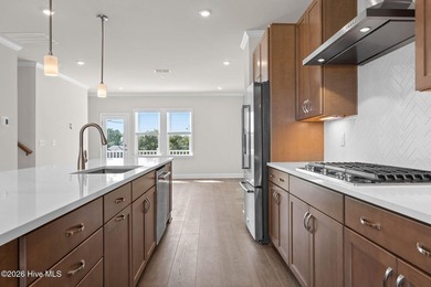 Discover refined coastal living at Lakeside Townes at - photo 17