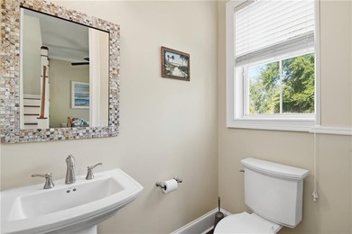 Welcome to 114 Riverfront Circle--an exceptional fully furnished