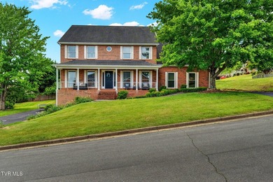 This elegant traditional brick home offers 4 bedrooms and 3.5 - photo 2