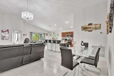 This charming 3-bedroom, 2-bath home offers a spacious open - photo 9