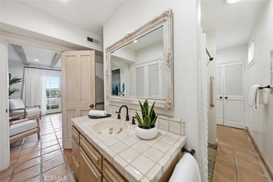 Feel right at home in this timeless Spanish-style condominium - photo 13
