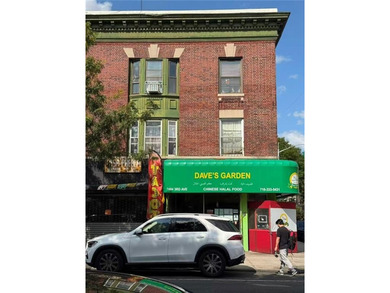 Rare street-corner mixed-use building offers both residential - photo 1