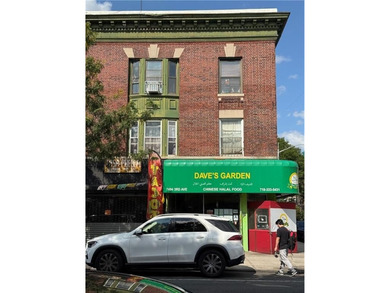 Rare street-corner mixed-use building offers both residential - photo 10