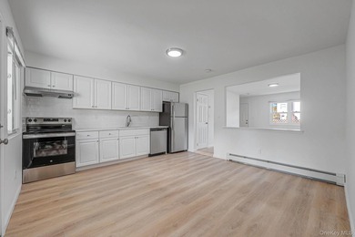 Rare opportunity to own a beautifully renovated legal 2-family - photo 3