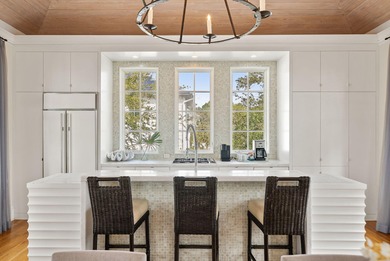 239 Sand Oaks Circle is a thoughtfully designed coastal retreat