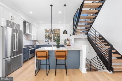 Now offering 4 bedroom layout! Welcome to Liberties Court, an - photo 2