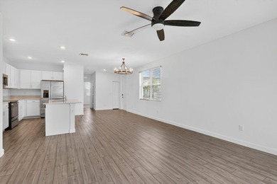 GORGEOUS CORNER UNIT W/ OPEN FLOOR PLAN & PLENTY OF WINDOWS - photo 12