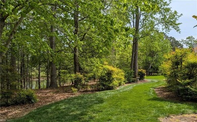 An exquisite home nestled on a double homesite bordering a - photo 47