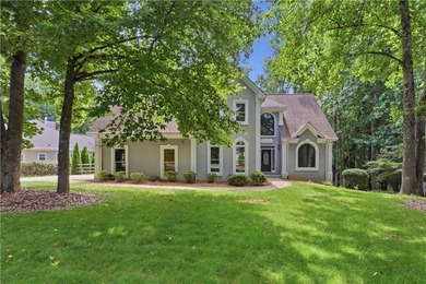 Enjoy stunning golf course views from this spacious home in the - photo 1