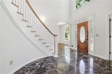 Enjoy stunning golf course views from this spacious home in the - photo 4