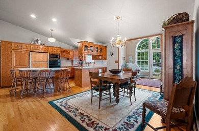 Beautiful arched-window entry welcomes you to this inviting lake - photo 12