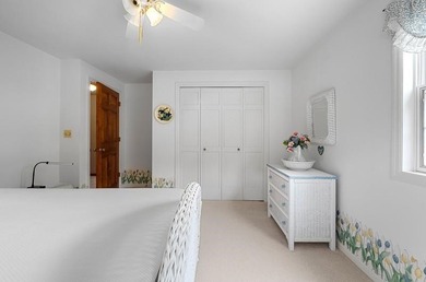 Beautiful arched-window entry welcomes you to this inviting lake - photo 36