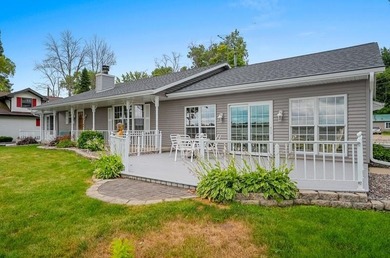 Beautiful arched-window entry welcomes you to this inviting lake - photo 46