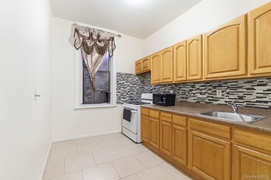 Exceptional brownstone six-unit multi-family building offering a - photo 11