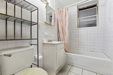 Exceptional brownstone six-unit multi-family building offering a - photo 14