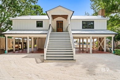 Discover paradise at this beautifully updated home on Mobile Bay - photo 1