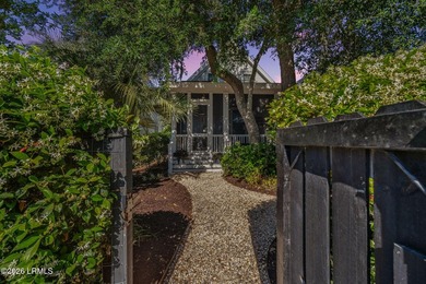 Set along one of Habersham's most charming streets, framed by a - photo 8