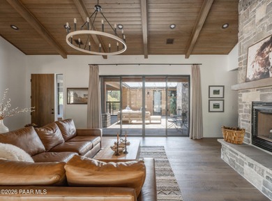 Stunning single level custom home on almost an acre in town!