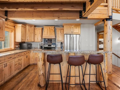 Custom log home nestled at the end of a quiet Cul-de-sac on two - photo 13