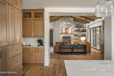 Stunning single level custom home on almost an acre in town!