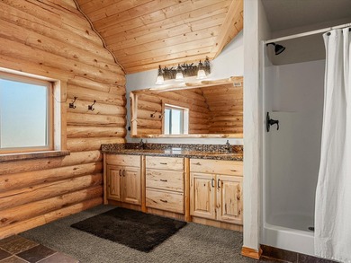 Custom log home nestled at the end of a quiet Cul-de-sac on two - photo 27