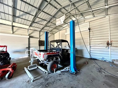 This property is a hunter and mechanic's dream. Eight acres of